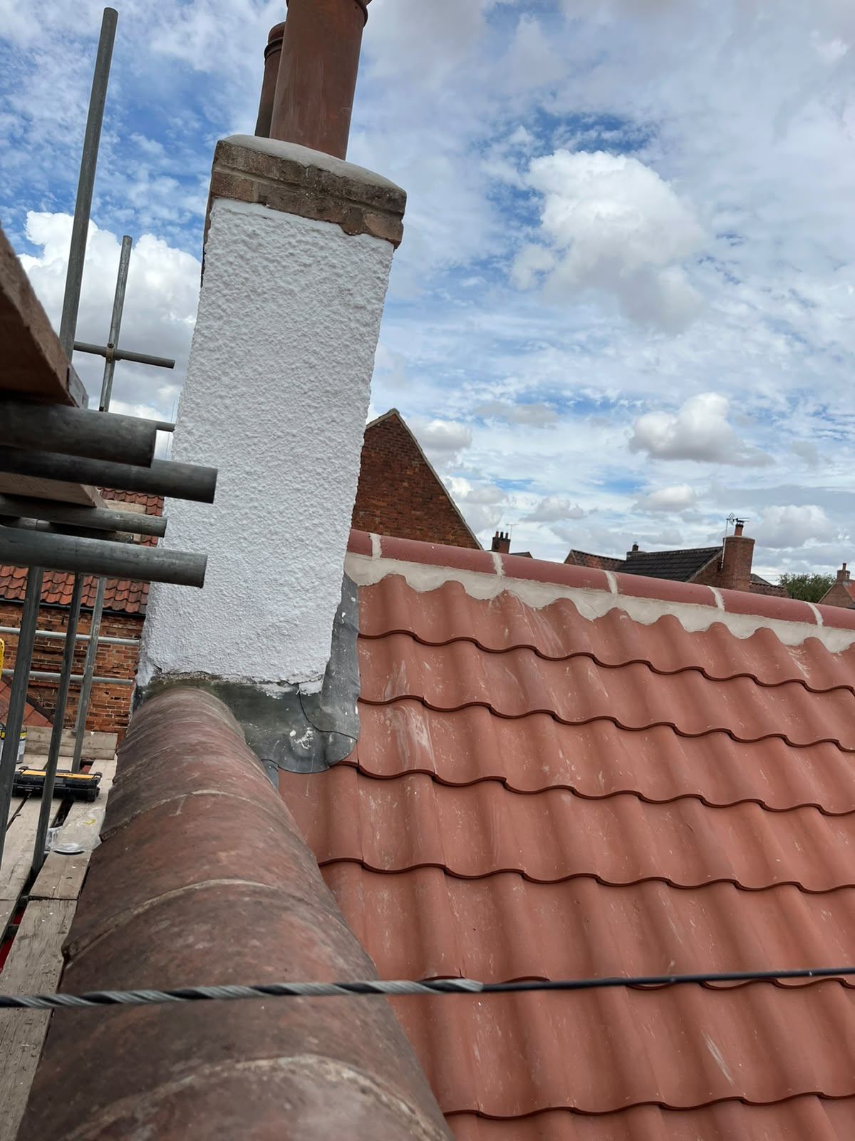 Chimney rebuilt and new flashings