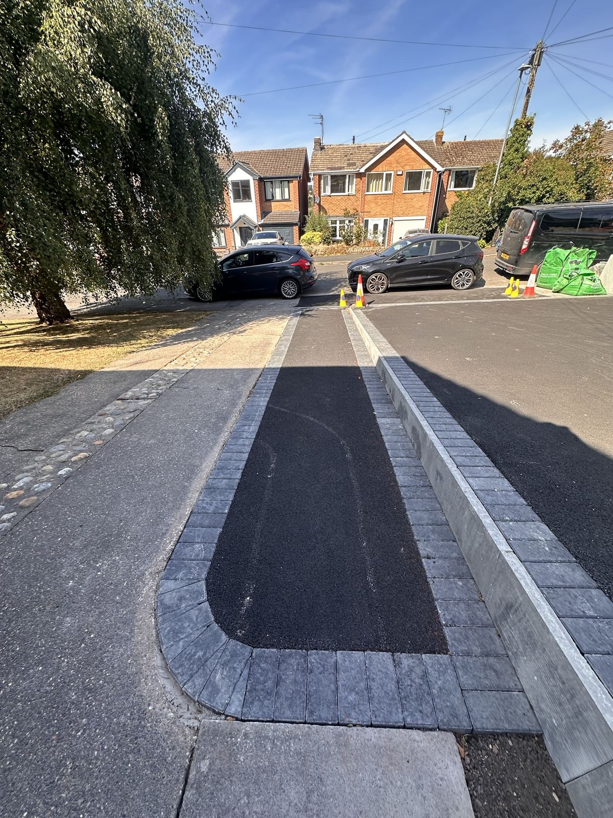 Drive with charcoal block edging
