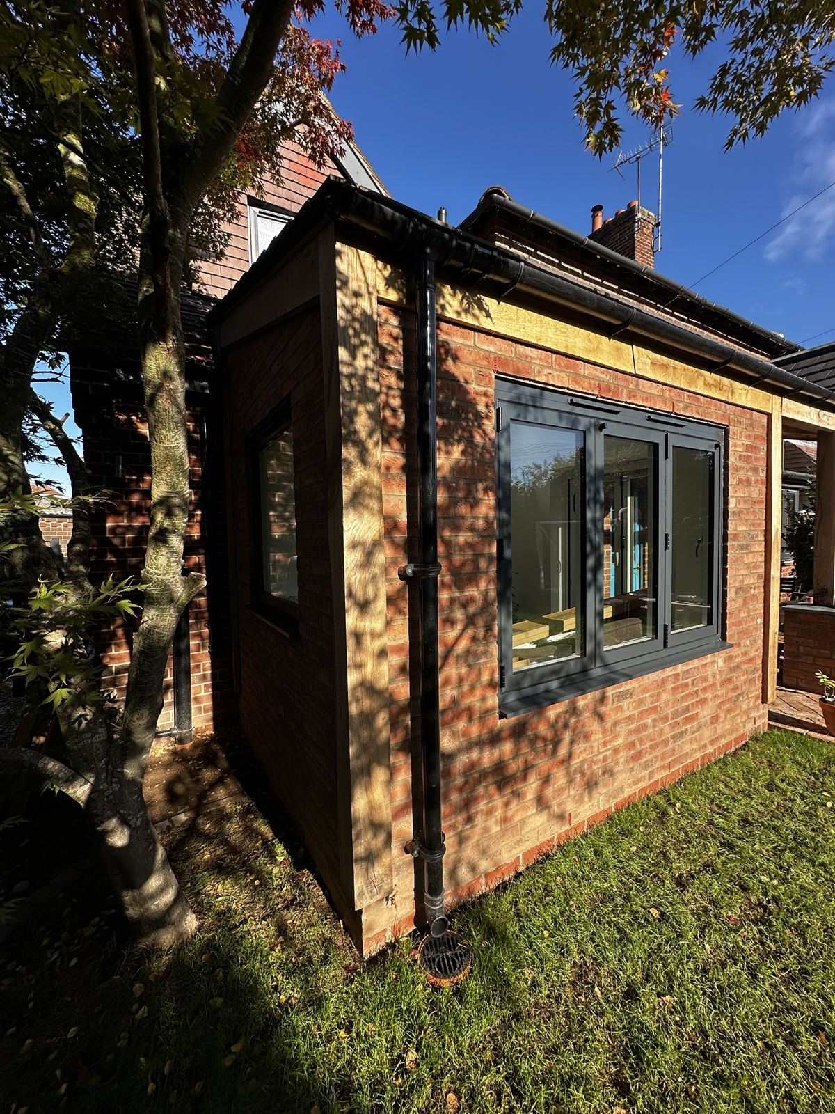 Oak posts and soft red brick